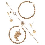 A MIXED LOT OF GOLD JEWELLERY in yellow gold, comprising a pair of earrings, a charm bracelet, a ...