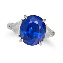 A SAPPHIRE AND DIAMOND RING set with an oval cut sapphire of 9.30 carats between two trillion cut...