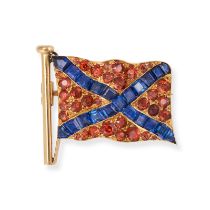 A GARNET AND SYNTHETIC SAPPHIRE FLAG BROOCH designed as a flag set with round cut garnets, accent...