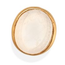 A WHITE AGATE INTAGLIO RING set with a white agate itaglio carved to depict a family crest, no as...