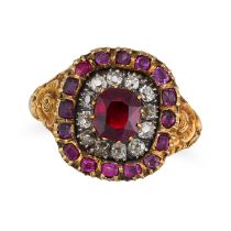 AN ANTIQUE RUBY AND DIAMOND CLUSTER RING in yellow gold, set with a cushion cut ruby of approxima...