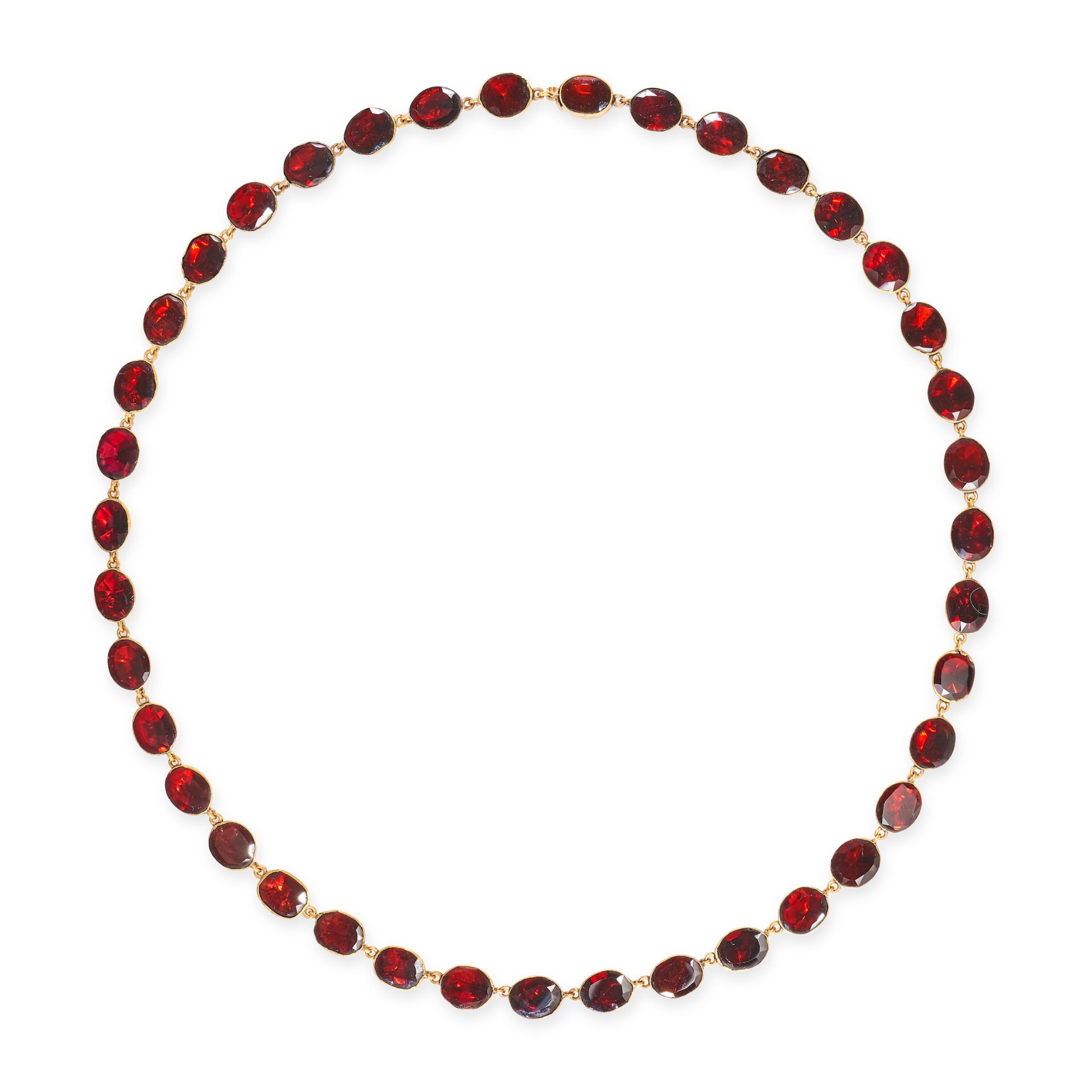 A GARNET RIVIERE NECKLACE comprising a row of oval and cushion cut garnets, stamped 9KT, 42.0cm, ...