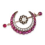 AN ANTIQUE RUBY AND DIAMOND CRESCENT MOON BROOCH in yellow gold and silver, designed as a crescen...