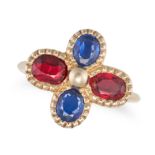 A SPINEL AND SAPPHIRE RING set with oval cut red spinels and blue sapphires in a quatrefoil motif...