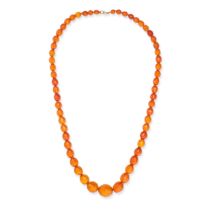 AN ANTIQUE VICTORIAN AMBER BEAD NECKLACE comprising a row of graduating faceted amber beads, stam...