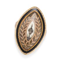 AN ANTIQUE GEORGIAN ENAMEL MOURNING RING in yellow gold, the navette shaped face decorated with a...