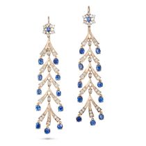 A PAIR OF SAPPHIRE AND DIAMOND DROP EARRINGS each comprising a round cut sapphire in a cluster of...