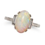 AN OPAL AND DIAMOND RING set with an oval cabochon opal accented on each side by a baguette cut d...