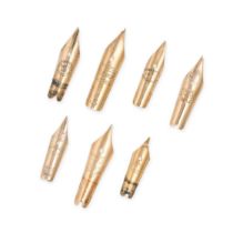 A COLLECTION OF ANTIQUE FOUNTAIN PEN NIBS in 14ct yellow gold, comprising seven nibs, stamped 14C...