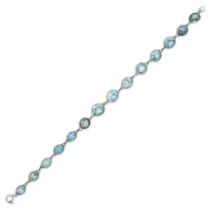 A BLUE ZIRCON BRACELET comprising a row of round cut blue zircons, no assay marks, 19.0cm, 8.7g.