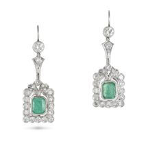 A PAIR OF EMERALD AND DIAMOND DROP EARRINGS each set with an octagonal step cut emerald in a bor...