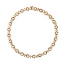 A PEARL NECKLACE in 9ct yellow gold, comprising a row of modular links set with half pearls, part...