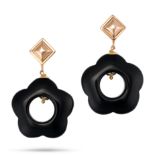 A PAIR OF ONYX DROP EARRINGS each comprising a gold stud suspending a carved onyx flower drop, st...