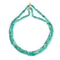 A TURQUOISE BEAD NECKLACE comprising two rows of polished rough turquoise beads, no assay marks, ...