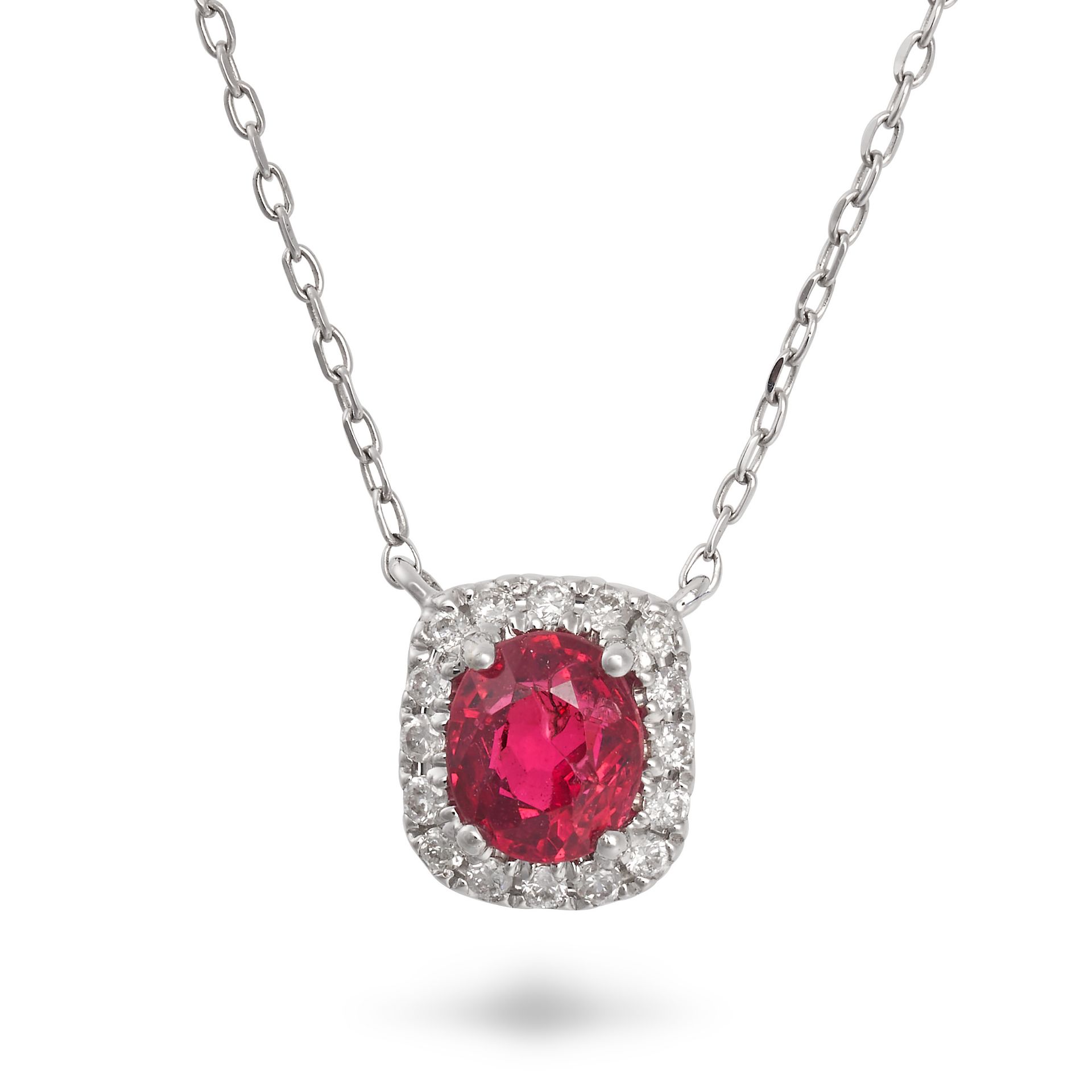 A SPINEL AND DIAMOND PENDANT NECKLACE set with an oval cut spinel in a border of round cut diamon...
