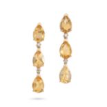A PAIR OF CITRINE AND DIAMOND DROP EARRINGS each set with a row of three pear cut citrines, accen...