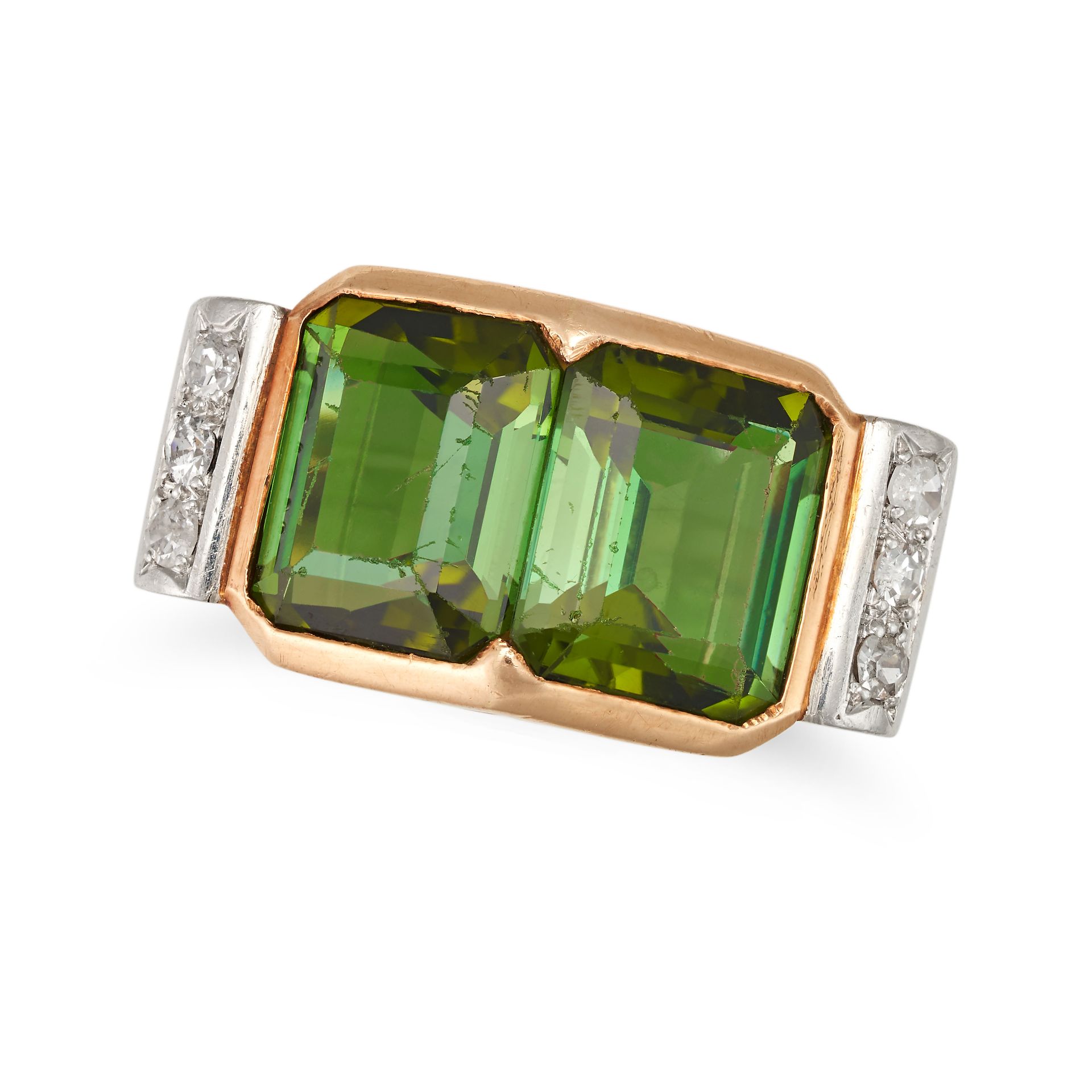 A RETRO GREEN TOURMALINE AND DIAMOND RING in yellow and white gold, set with two octagonal step c...