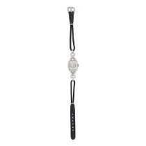 BULOVA, A DIAMOND WRISTWATCH 17 jewel wind movement, the rectangular case with a white dial and A...