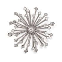 A VINTAGE DIAMOND SUNBURST BROOCH in white gold, the body set throughout with round brilliant and...