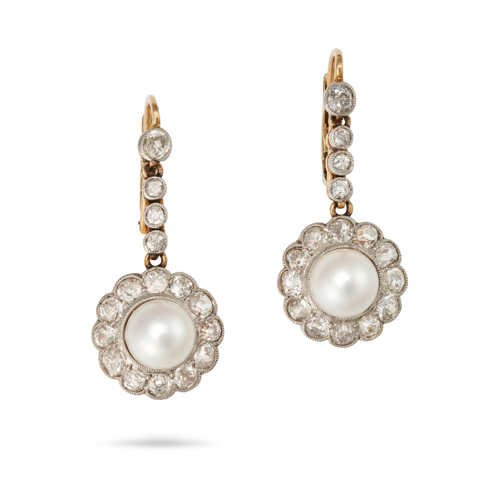 A PAIR OF PEARL AND DIAMOND DROP CLUSTER DROP EARRINGS each comprising a row of old cut diamonds ...