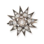 AN ANTIQUE DIAMOND STAR BROOCH in yellow gold and silver, designed as a twelve rayed star set wit...