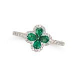 AN EMERALD AND DIAMOND FLOWER DRESS RING of quatrefoil design, set with four pear cut emeralds wi...