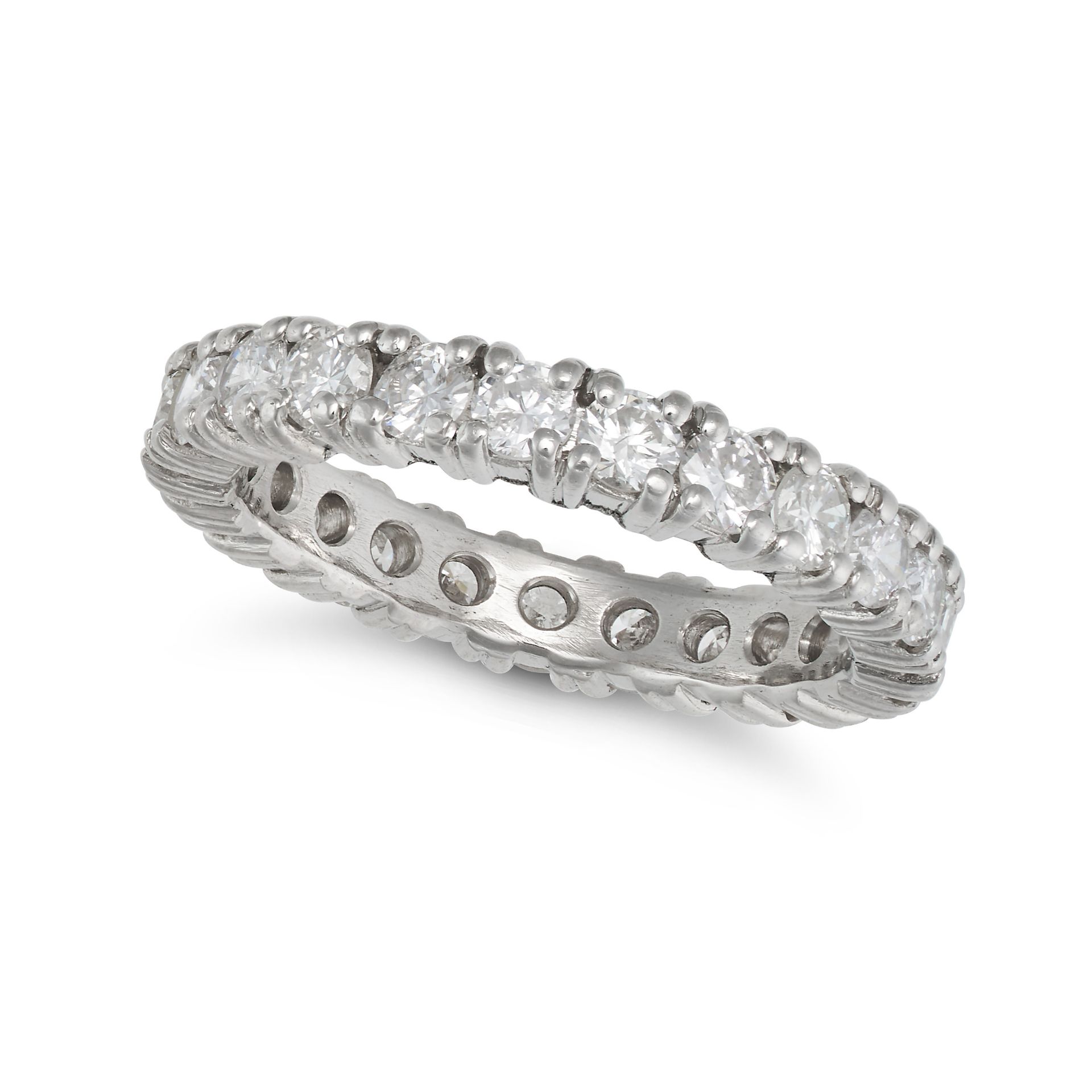 A DIAMOND ETERNITY RING set all around with a row of round brilliant cut diamonds, the diamonds a...