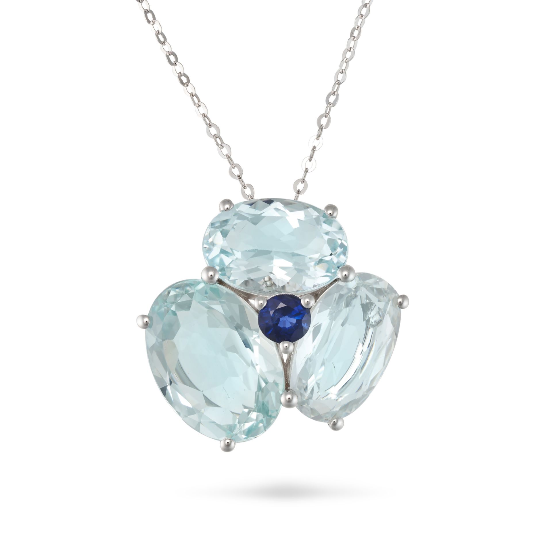 AN AQUAMARINE AND SAPPHIRE PENDANT NECKLACE set with a round cut sapphire in a cluster of three o...