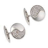 A PAIR OF DIAMOND CUFFLINKS in 18ct white gold, the circular faces designed as the yin and yang, ...