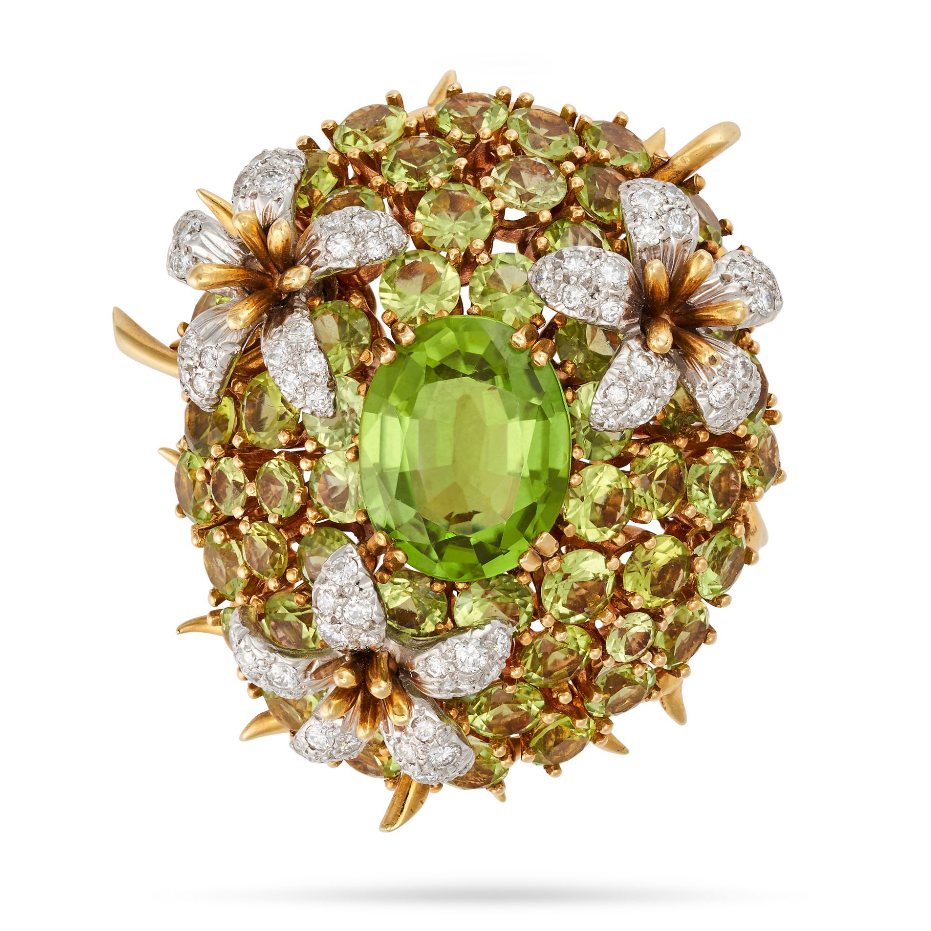 JEAN SCHLUMBERGER FOR TIFFANY & CO., A VINTAGE PERIDOT AND DIAMOND FLOWER BROOCH in 18ct yellow g...