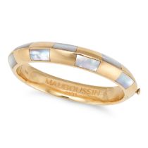 MAUBOUSSIN, A MOTHER OF PEARL BANGLE the hinged bangle set with slices of mother of pearl, signed...
