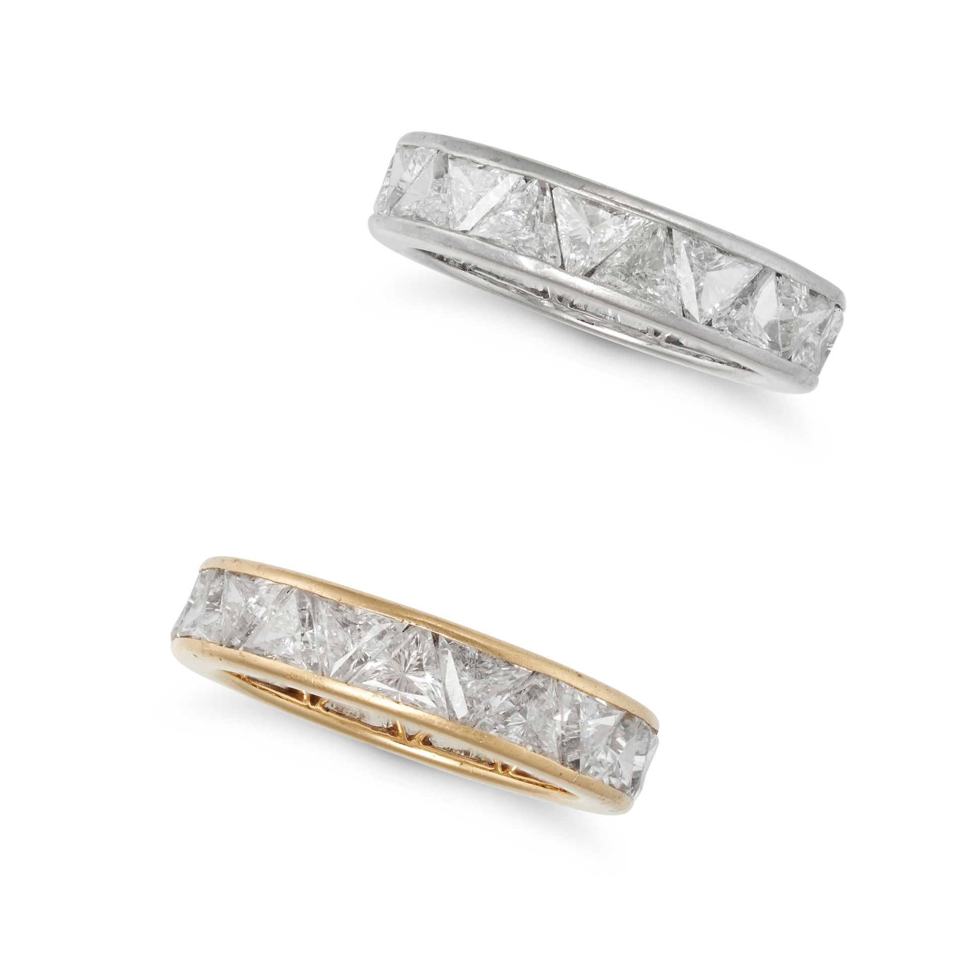 HARRY WINSTON, A PAIR OF DIAMOND ETERNITY RINGS in 18ct yellow gold and platinum, each in identic...