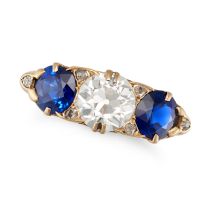 AN ANTIQUE DIAMOND AND SAPPHIRE THREE STONE RING in 18ct yellow gold, set with an old European cu...