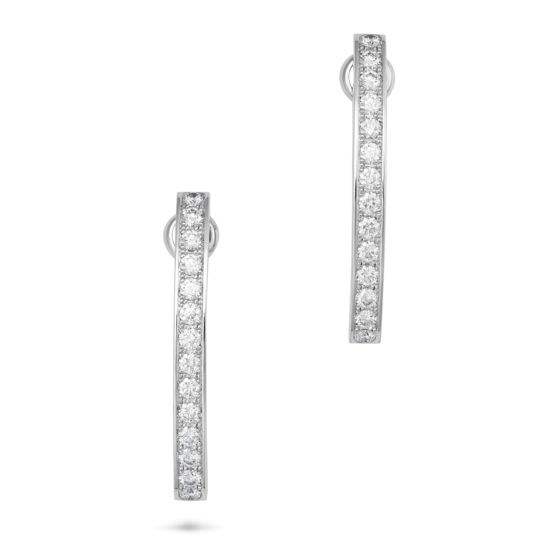 CHOPARD, A PAIR OF DIAMOND EARRINGS each comprising a curved row set with round brilliant cut  di...