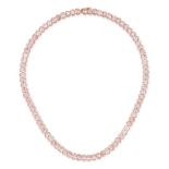 A MORGANITE LINE NECKLACE comprising a row of oval cut morganites, the morganites all totalling 5...