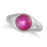 A STAR RUBY AND DIAMOND THREE STONE RING set with a round cabochon star ruby accented on each sid...
