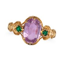 A PINK TOPAZ AND EMERALD RING set with an oval cut pink topaz of approximately 2.17 carats accent...