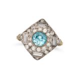 A BLUE ZIRCON AND DIAMOND DRESS RING set with a round cut blue zircon accented by round brilliant...