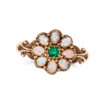 AN ANTIQUE EMERALD AND OPAL CLUSTER RING in 15ct yellow gold, set with a square step cut emerald ...