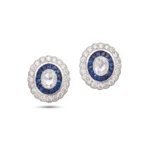 A PAIR OF DIAMOND AND SAPPHIRE TARGET EARRINGS each set with a rose cut diamond in a border of ca...