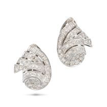 A PAIR OF RETRO DIAMOND EARRINGS in white gold and platinum, each in a scrolling design and set t...