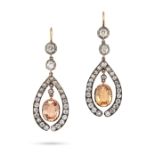 A PAIR OF ANTIQUE TOPAZ AND DIAMOND DROP EARRINGS in yellow gold and silver, each comprising a ro...