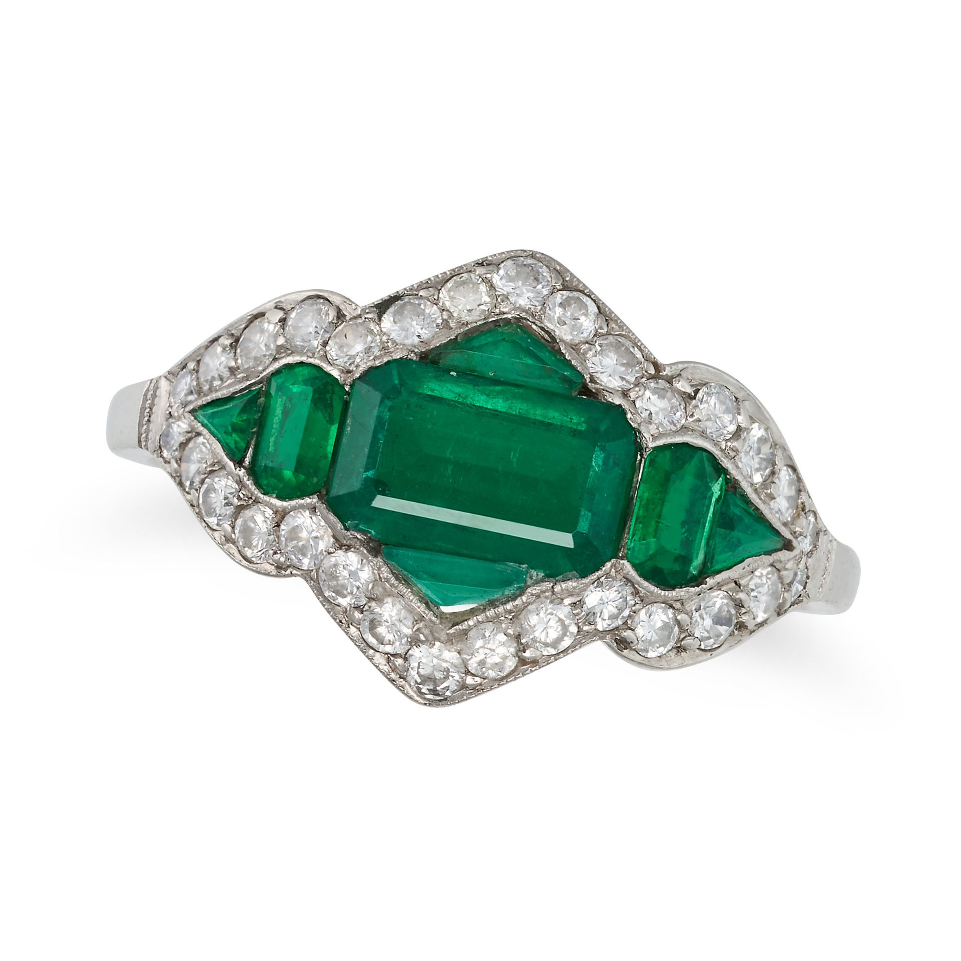 AN EMERALD AND DIAMOND RING set with step cut emeralds in a border of round brilliant cut diamond...