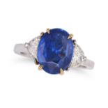 A SAPPHIRE AND DIAMOND THREE STONE RING set with an oval cut sapphire of approximately 3.19 carat...