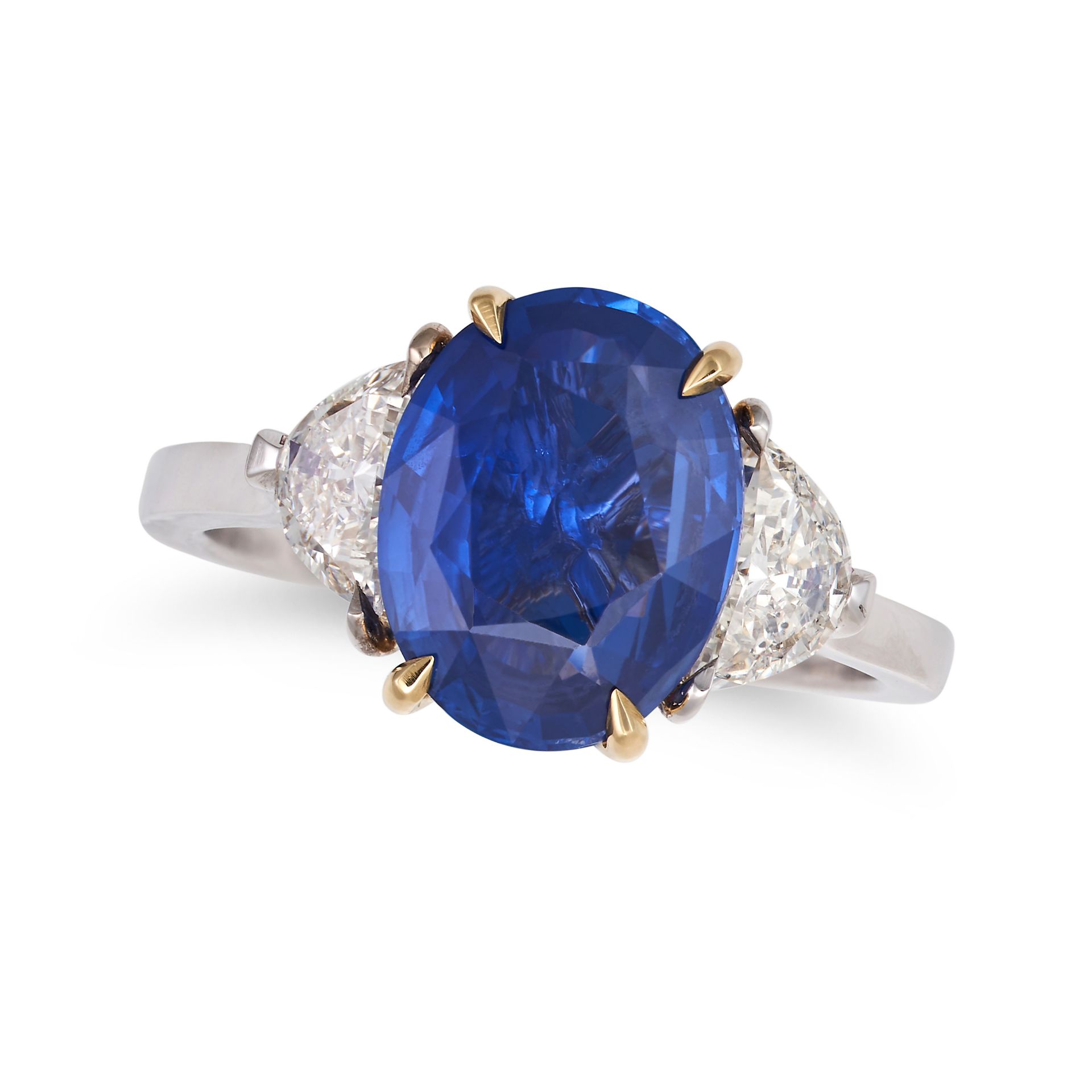 A SAPPHIRE AND DIAMOND THREE STONE RING set with an oval cut sapphire of approximately 3.19 carat...