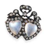 AN ANTIQUE MOONSTONE AND DIAMOND SWEETHEART RING in yellow gold and silver, set with two heart sh...