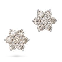 A PAIR OF DIAMOND CLUSTER EARRINGS each set with a cluster of round brilliant cut diamonds, the d...