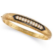 AN ANTIQUE PEARL AND ENAMEL BANGLE in yellow gold, the hinged bangle engraved with foliate design...