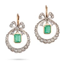 A PAIR OF EMERALD AND DIAMOND DROP EARRINGS each designed as a bow suspending a hoop set througho...