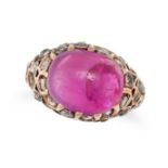 A RUBY AND DIAMOND RING set with an oval cabochon ruby accented by rose cut diamonds, no assay ma...